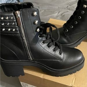 Black Steve Madden booties with studs